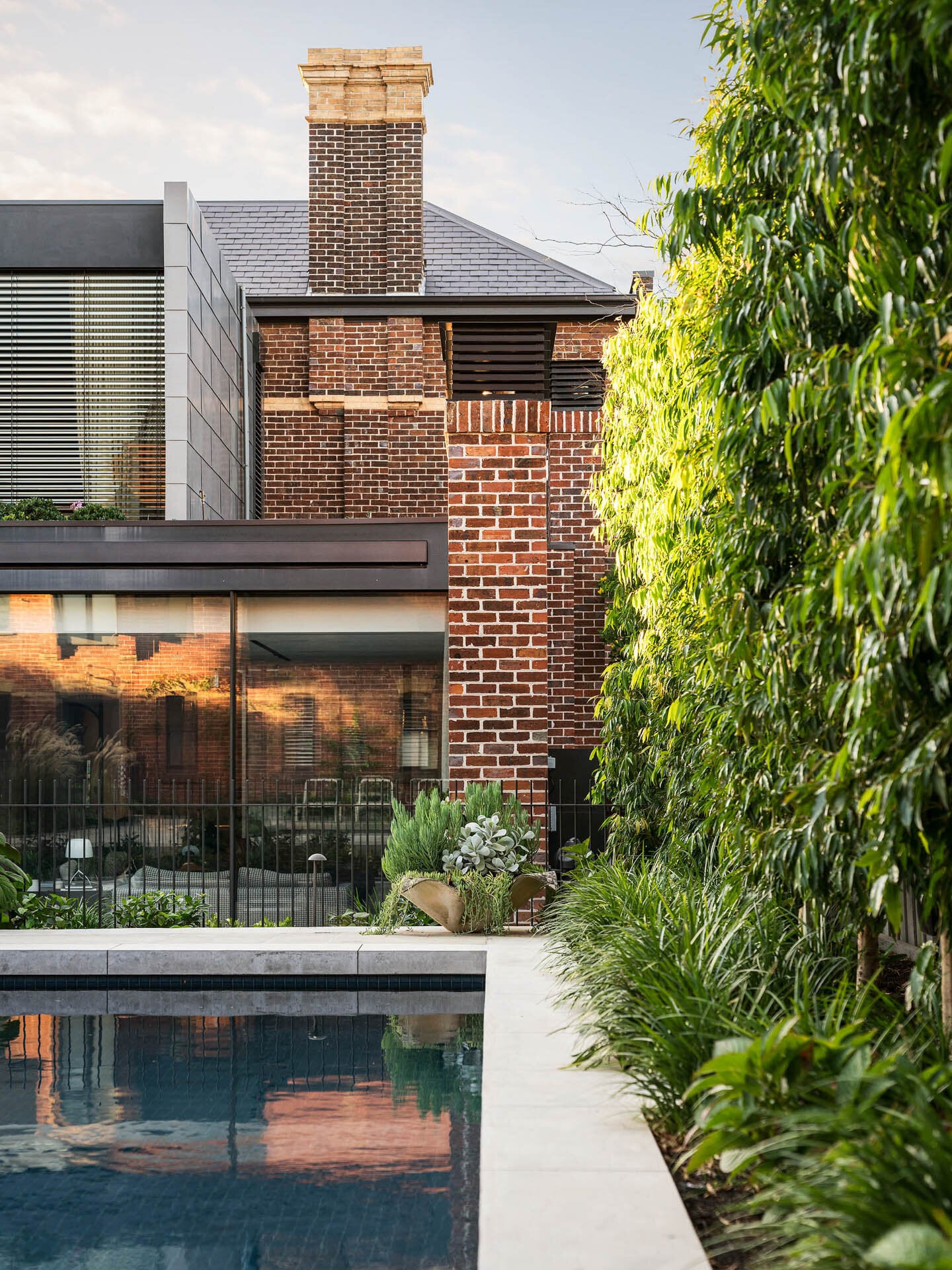 A modern house  Armadale with a swimming pool and garden.